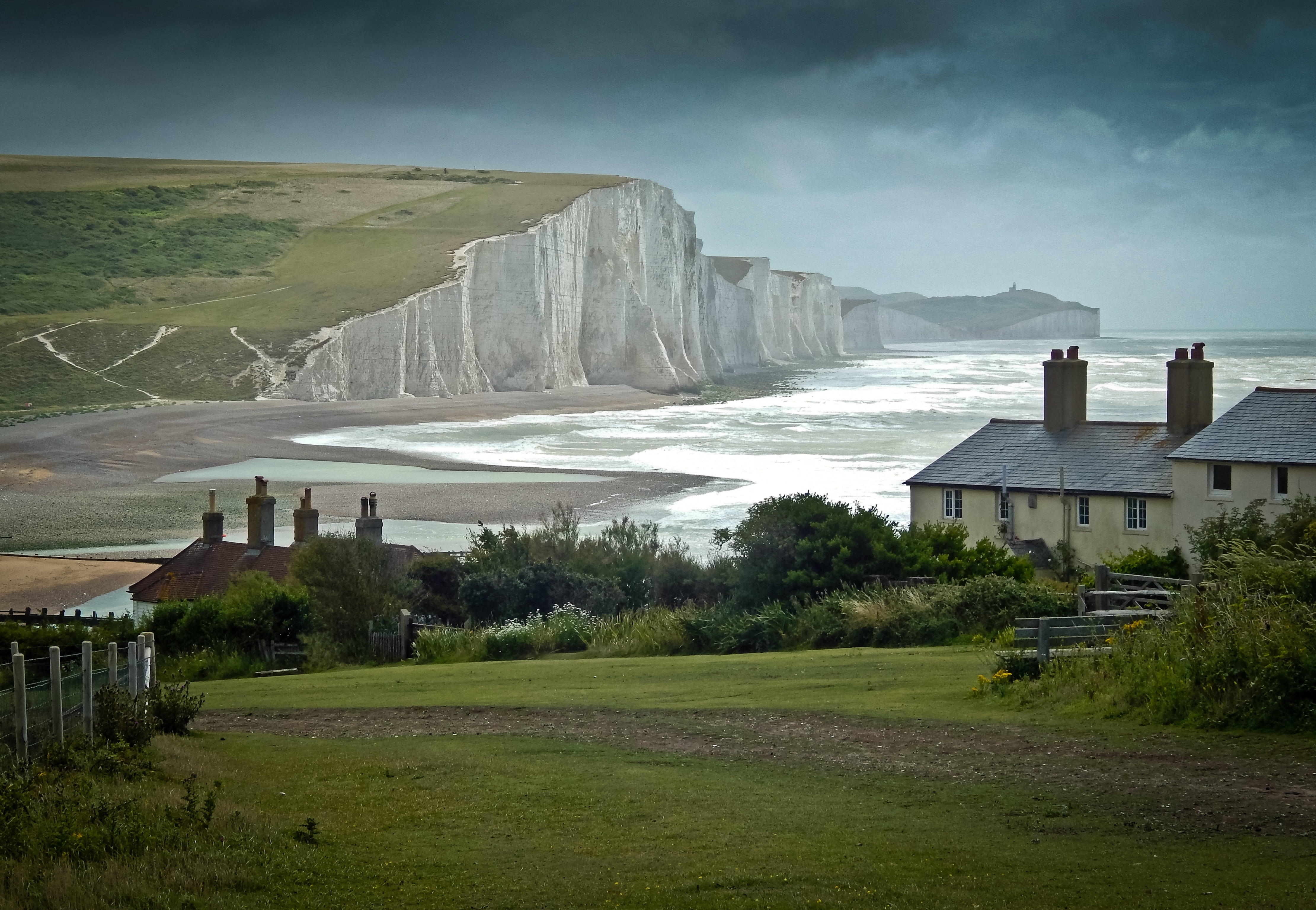 green leaf trees beside white wooden house at daytime cuckmere 2k 4k
