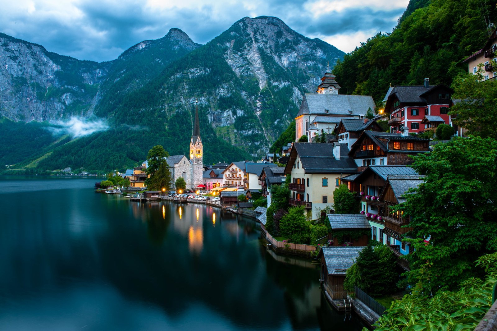 sterreich Austria body of water near houses and mountains photo 2k 4k