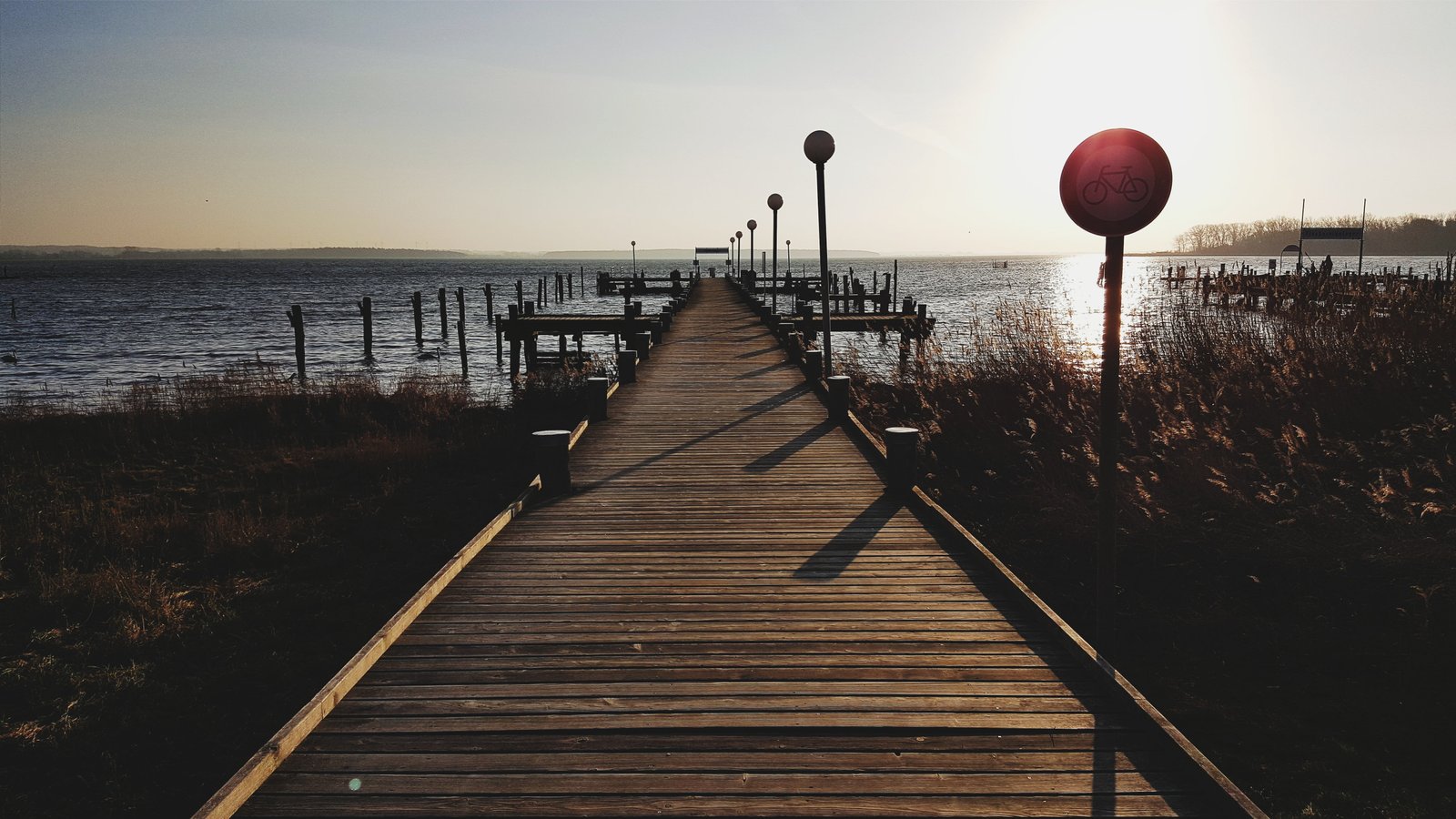 brown wooden dock beach landscape sunrise sunset Sweden 2k 4k 5k