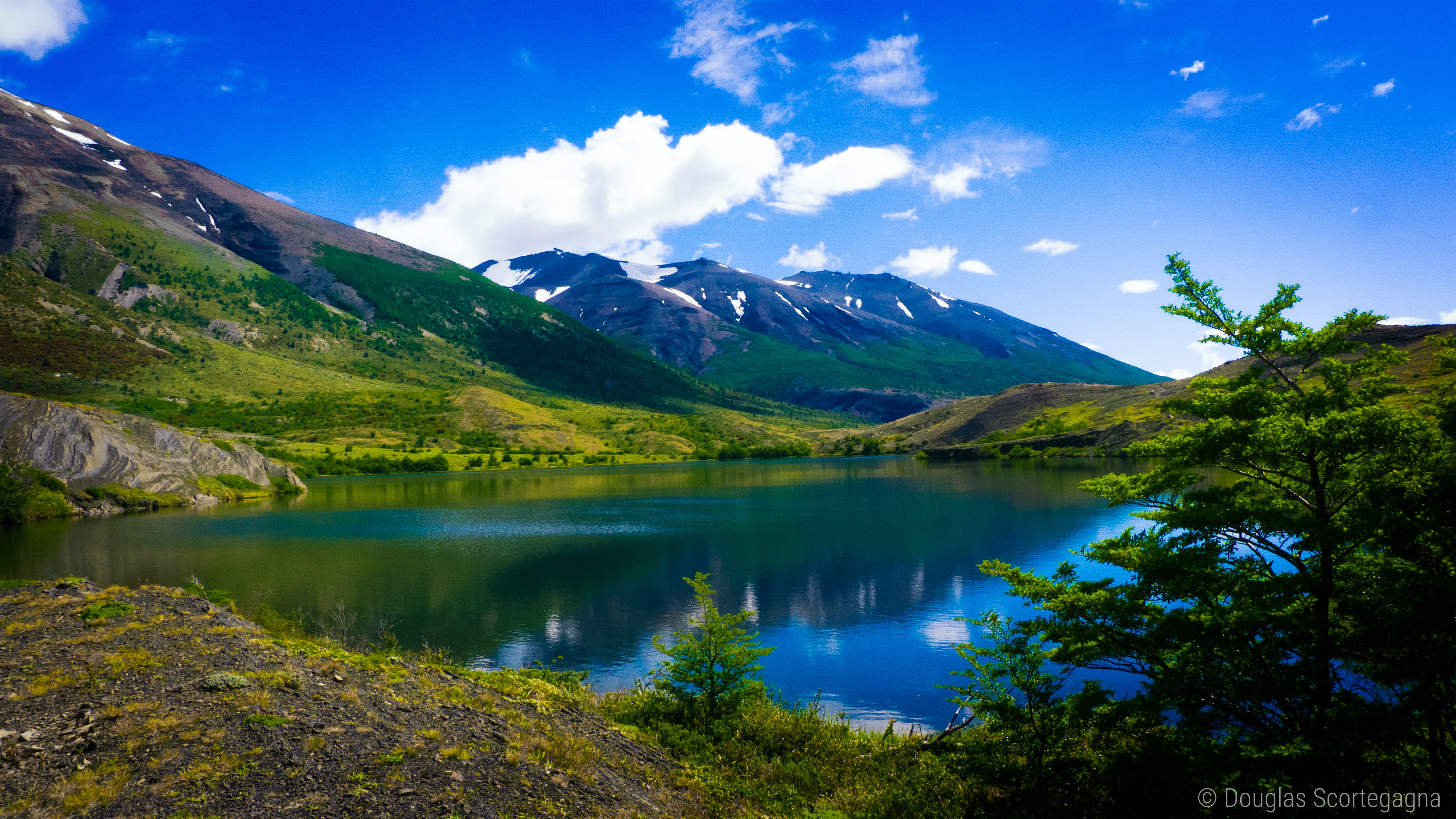 green trees near mountain with body of water Colors Patagonia 2k 4k