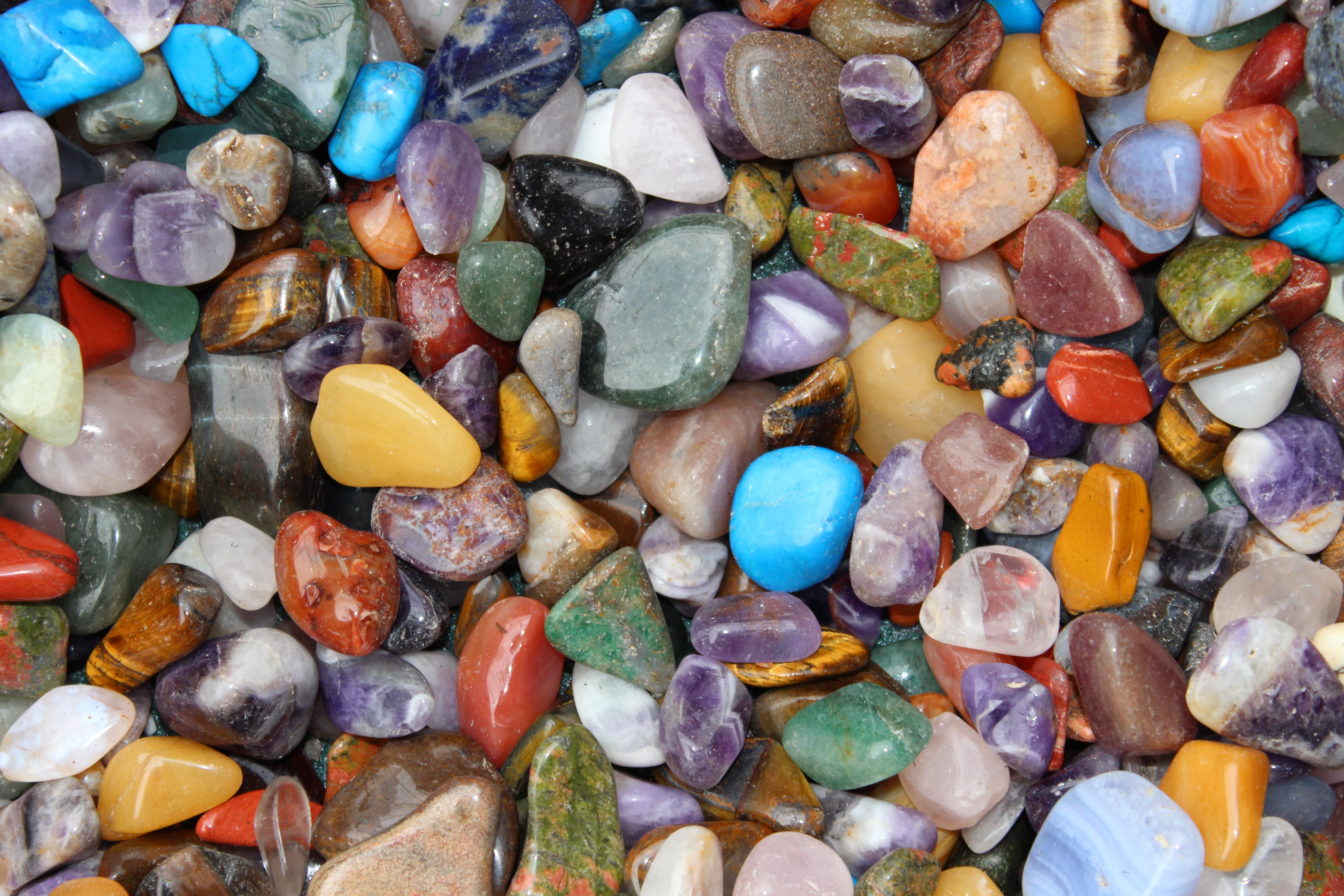 scattered assorted color pebbles gems stones crystal gemstone 2k 4k 5k