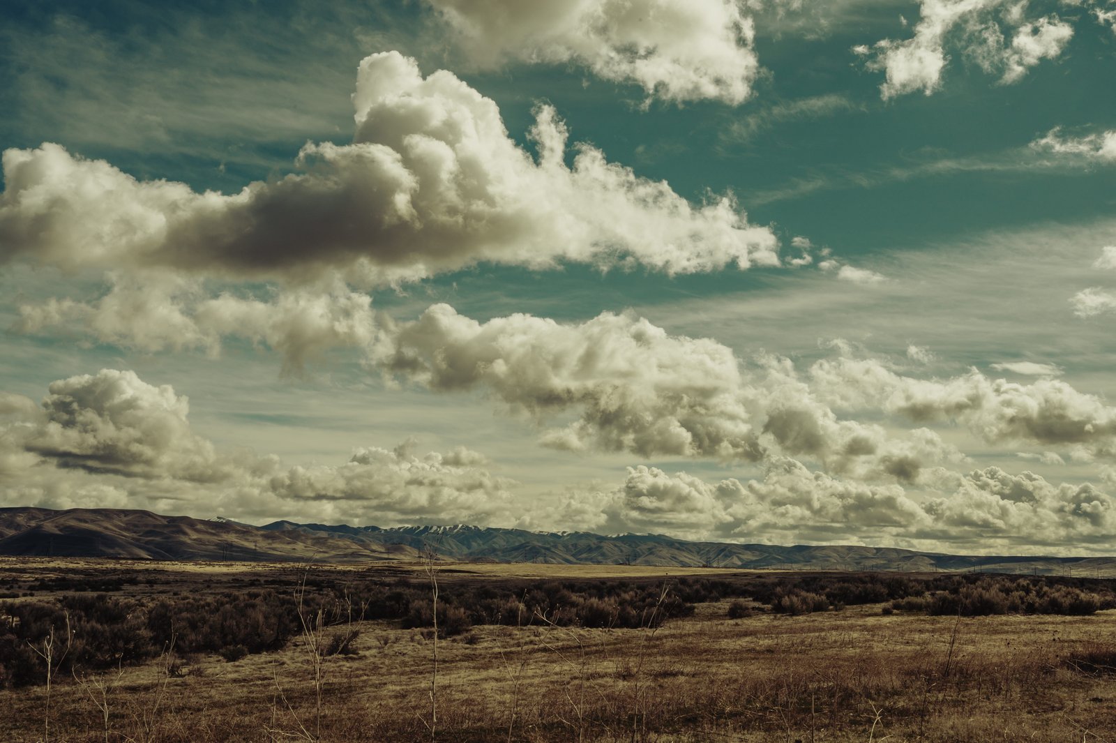 Scenic View Of Mountains Under Cloudy Sky wallpaper clouds 2k 4k 5k
