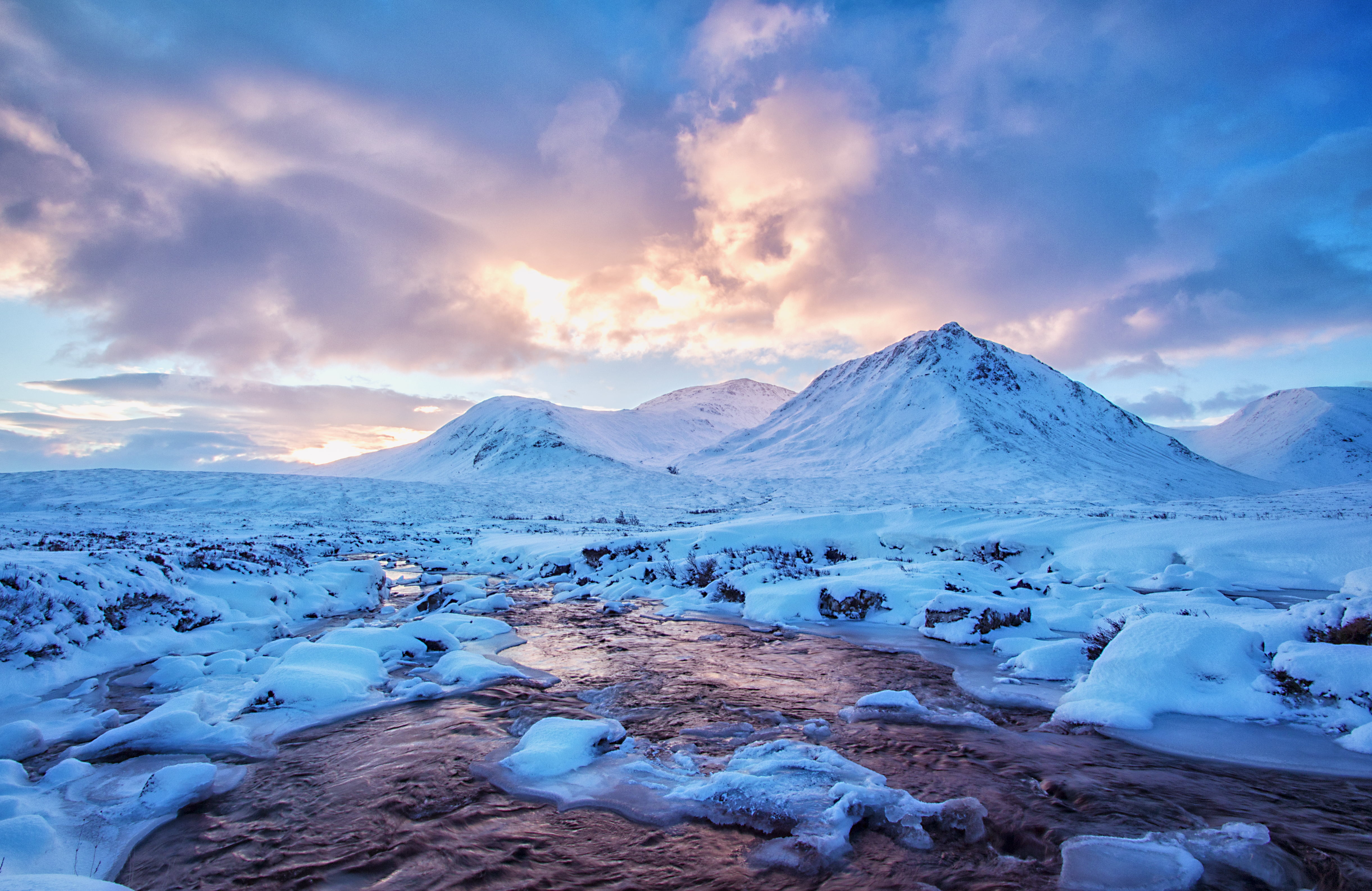 Snow covered mountain beside body of water Scotland West Highlands 2k 4k 5k