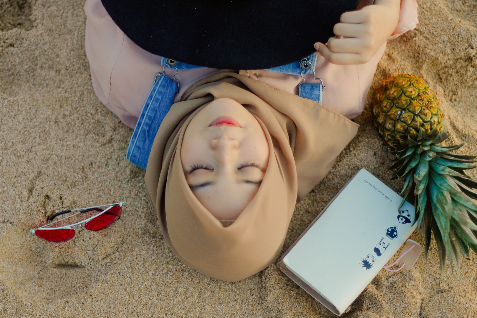Woman Lying on Sand Beside Sunglasses adult beach beautiful 2k 4k 5k