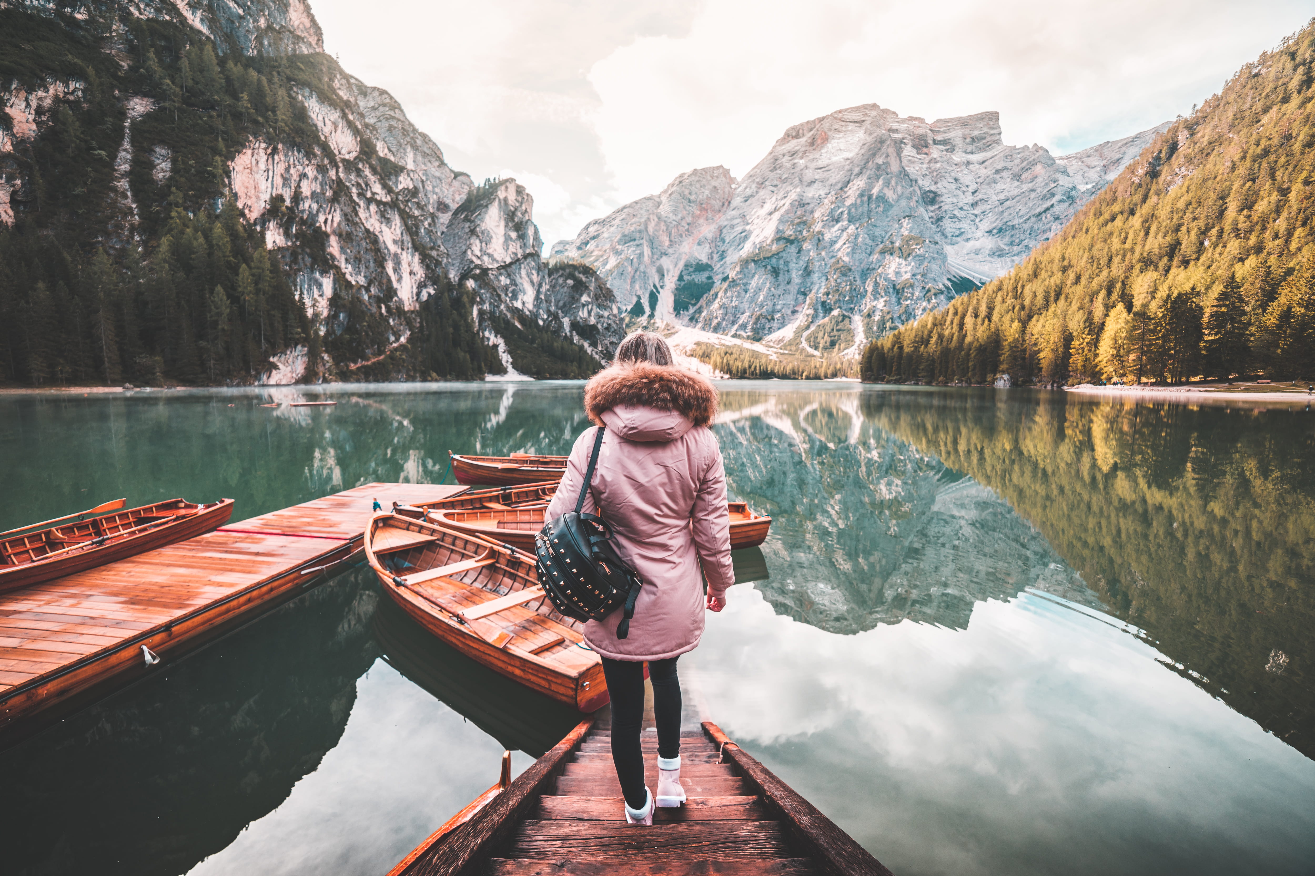 Young Woman Enjoying Beautiful Scenery of Lago di Braies Italy 2k 4k 5k
