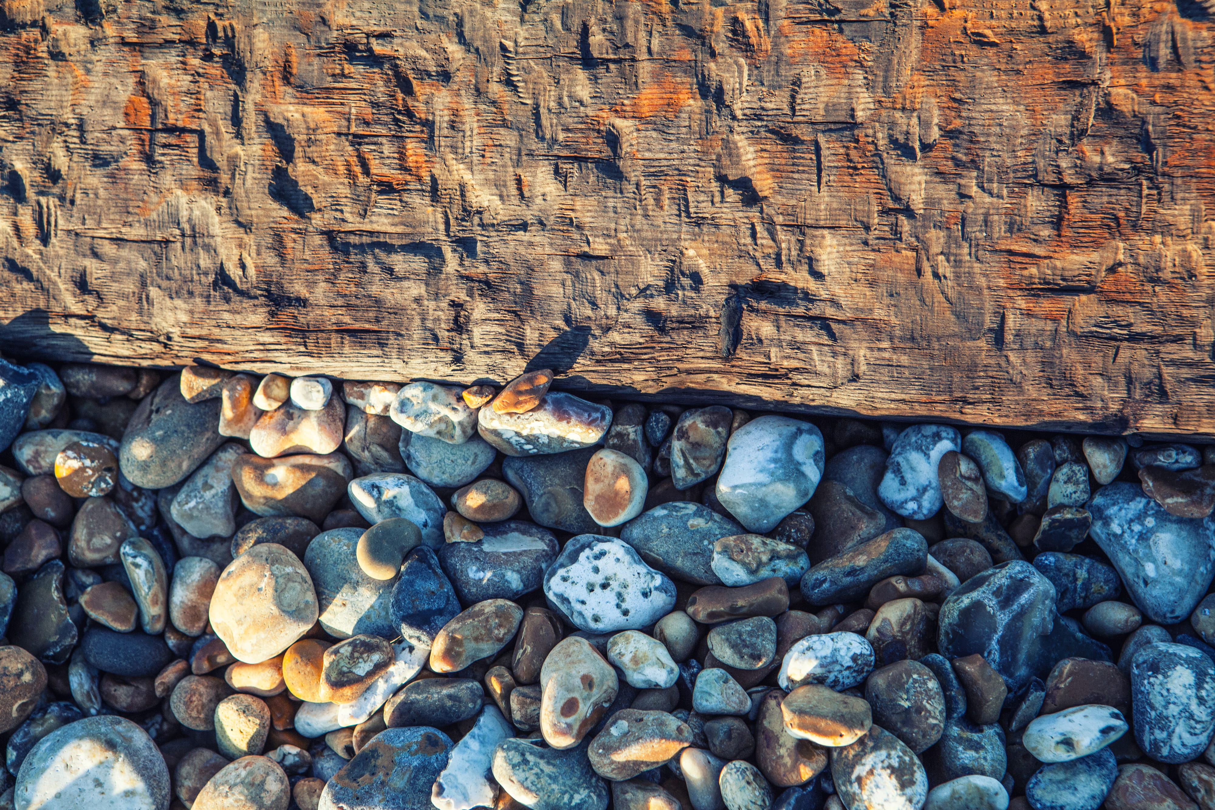 This is a shot captured on the beach at Deal In Kent England pebbles rest beside an old wooden groyne 2k 4k
