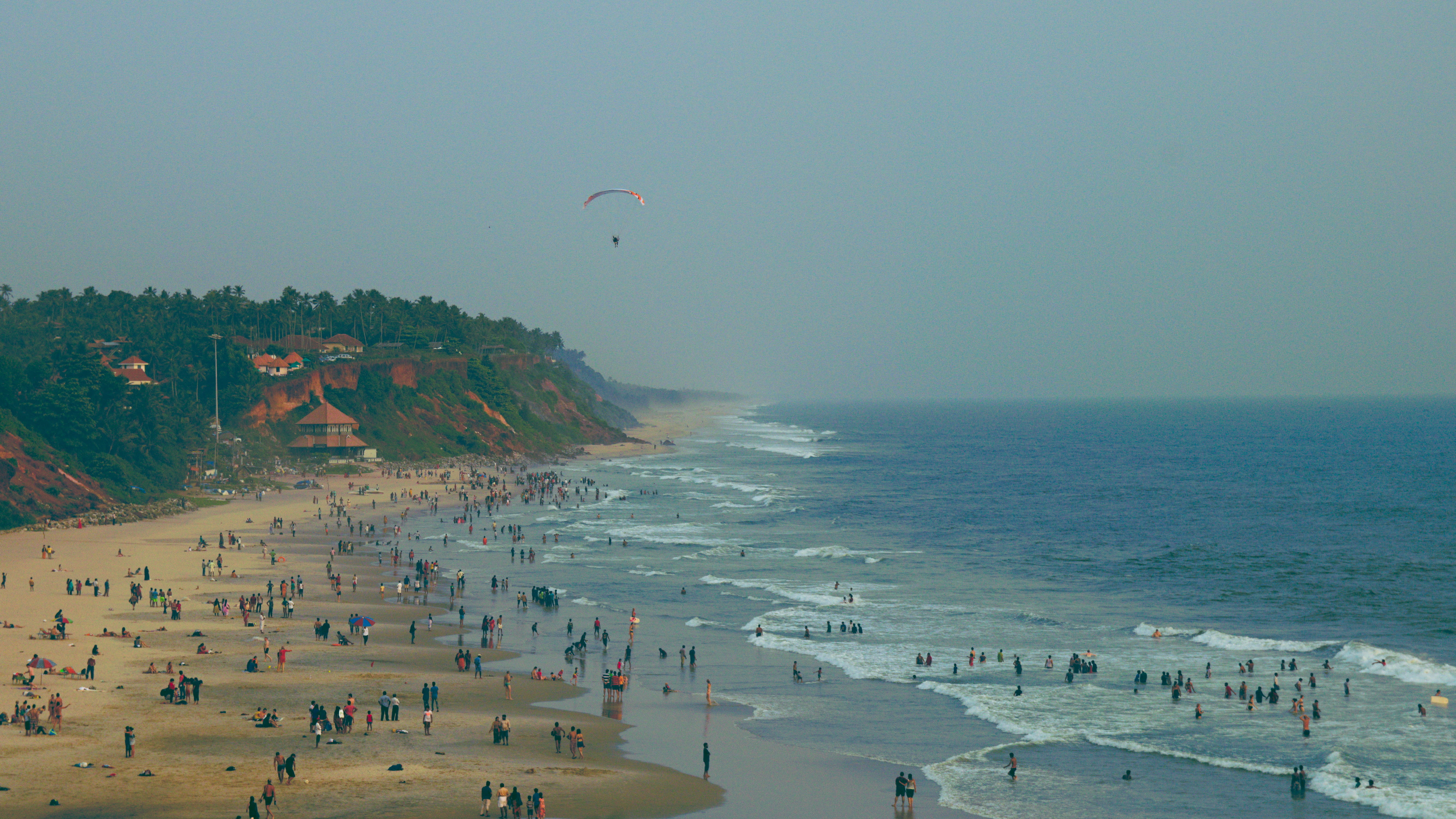 varkala india papanasam beach waves ocean paragliding 2k 4k 5k