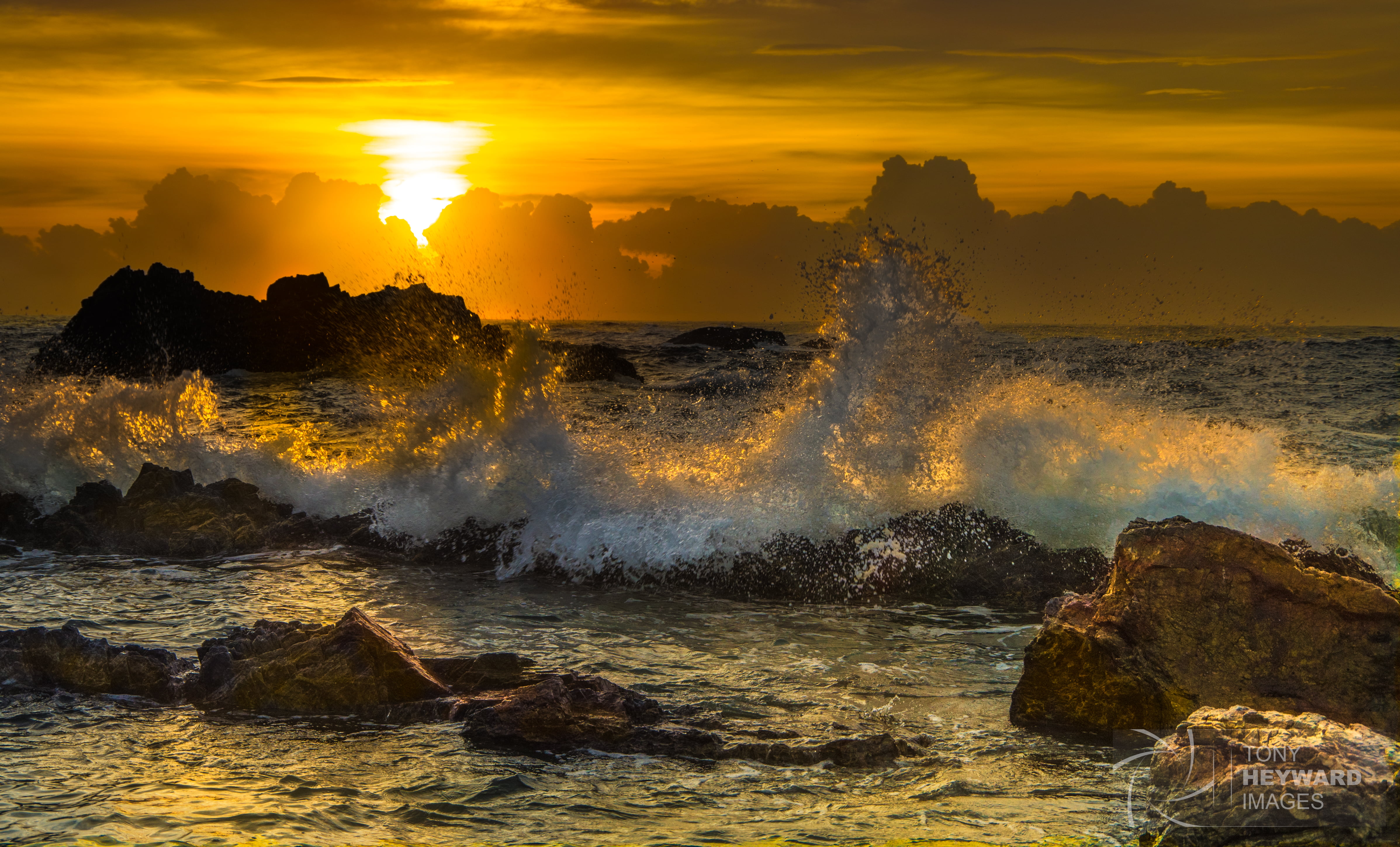 water splash on rock formation during sunset waves Bermagui 2k 4k 5k