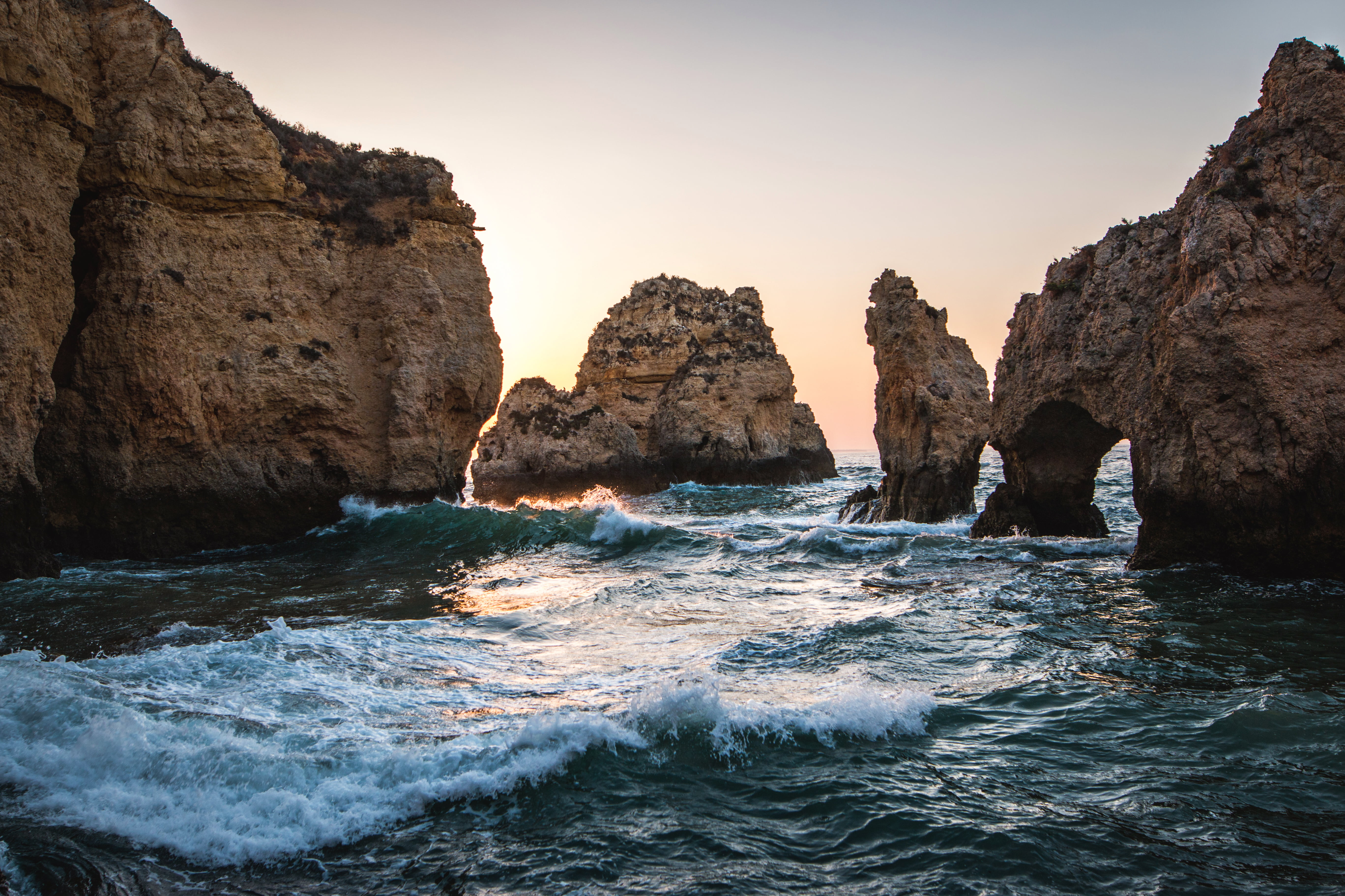 body of water Portugal lagos sunrise Europe rocks cliff 2k 4k 5k