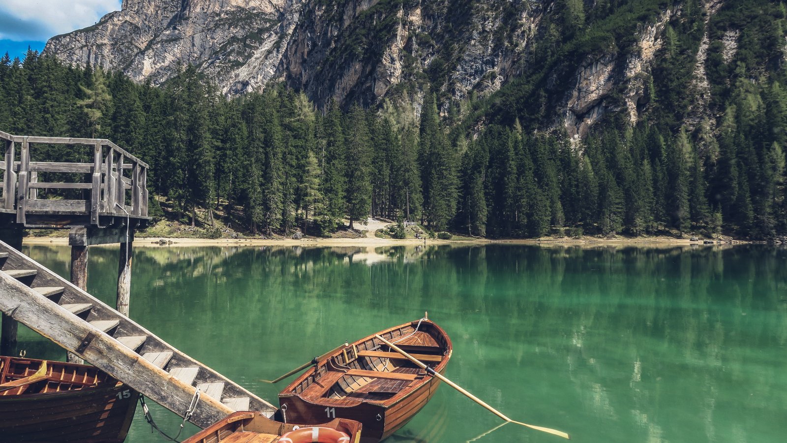 brown boat on body of water nature trees mountains beauty in 2k 4k 5k