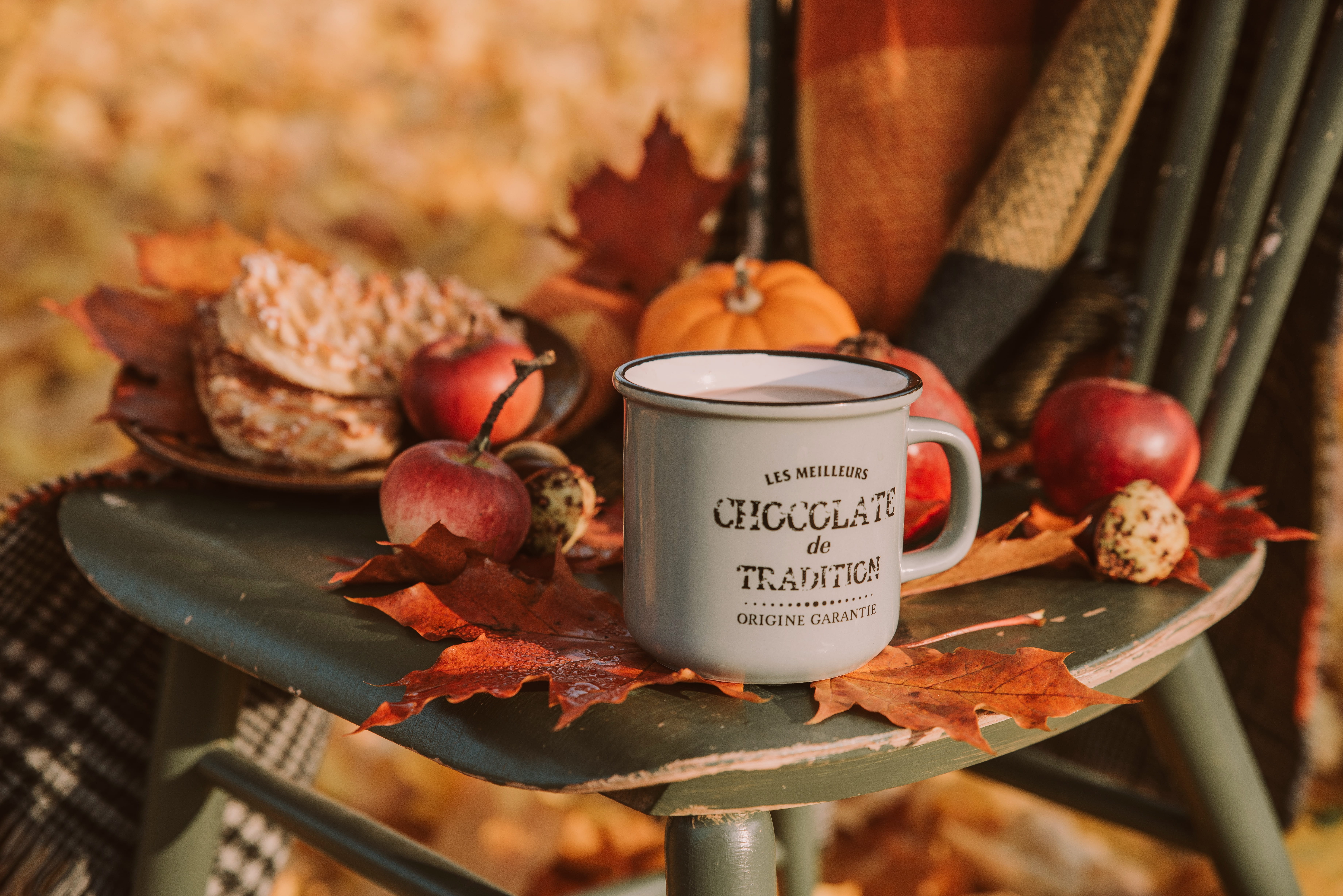 white and black mug near maple leaves pastry on table warm 2k 4k 5k