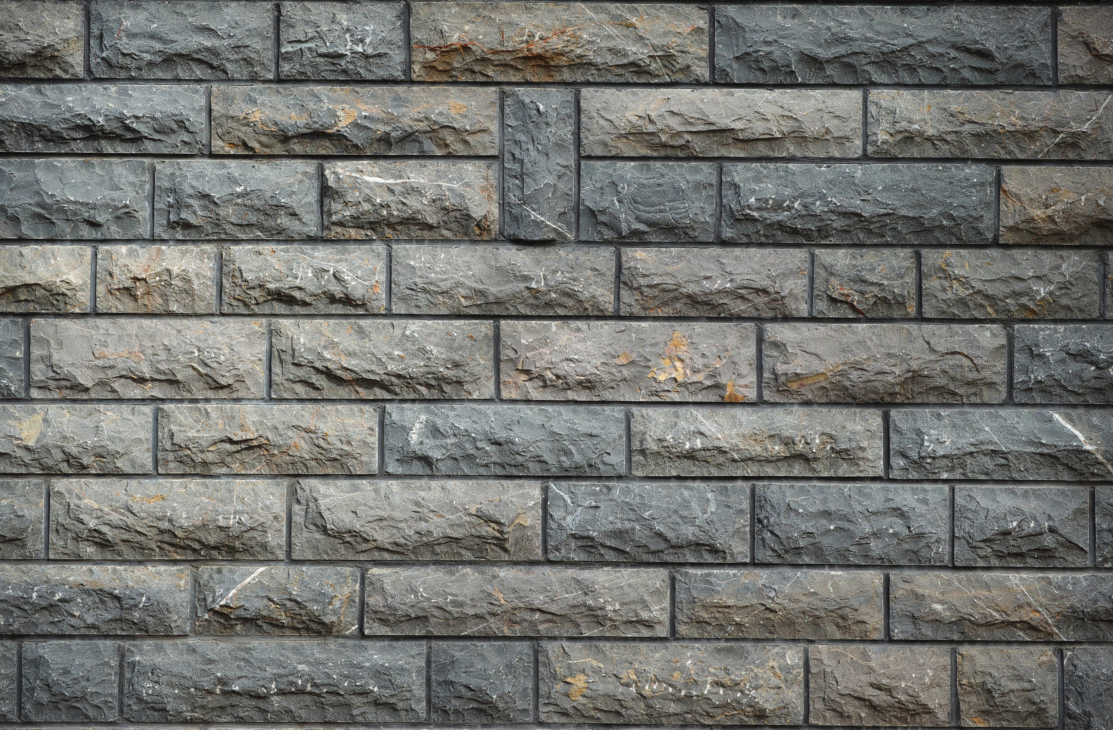 brown and gray brick wall surface granite grey solid macro 2k 4k 5k