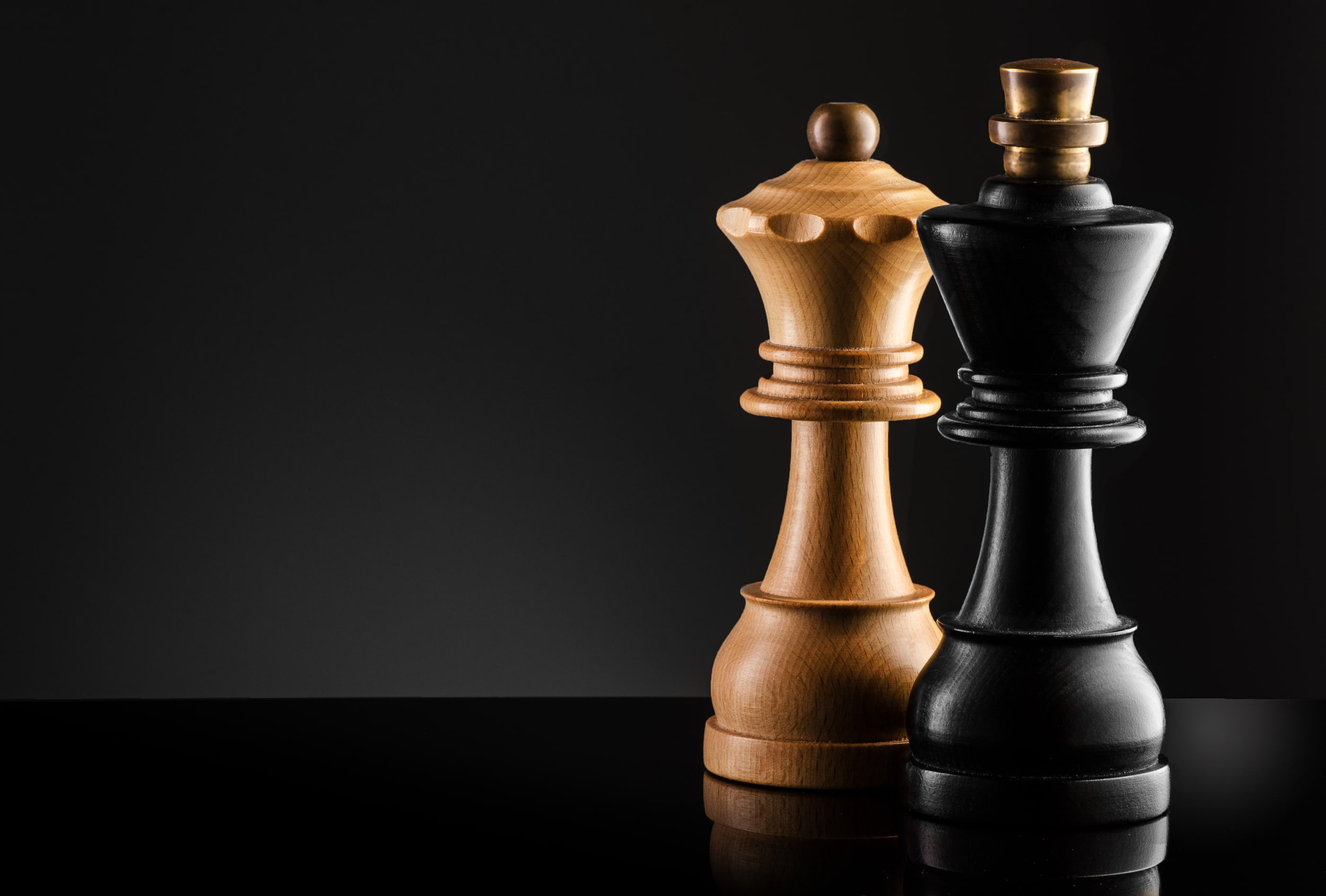 brown queen and black king chess pieces macro figure strategy 36 2k