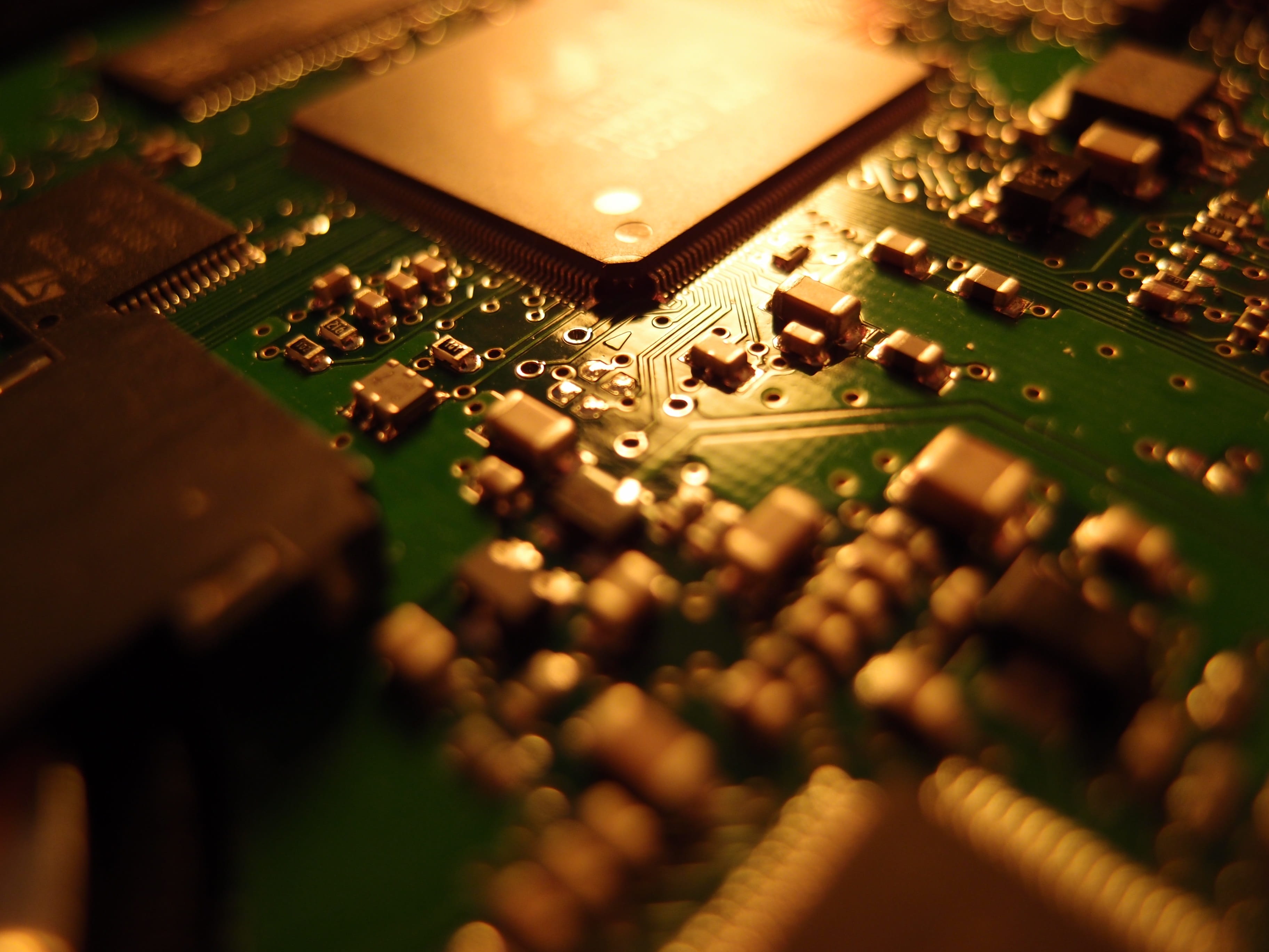 macro photo of green circuit board Computer Electronics solder joint 2k 4k