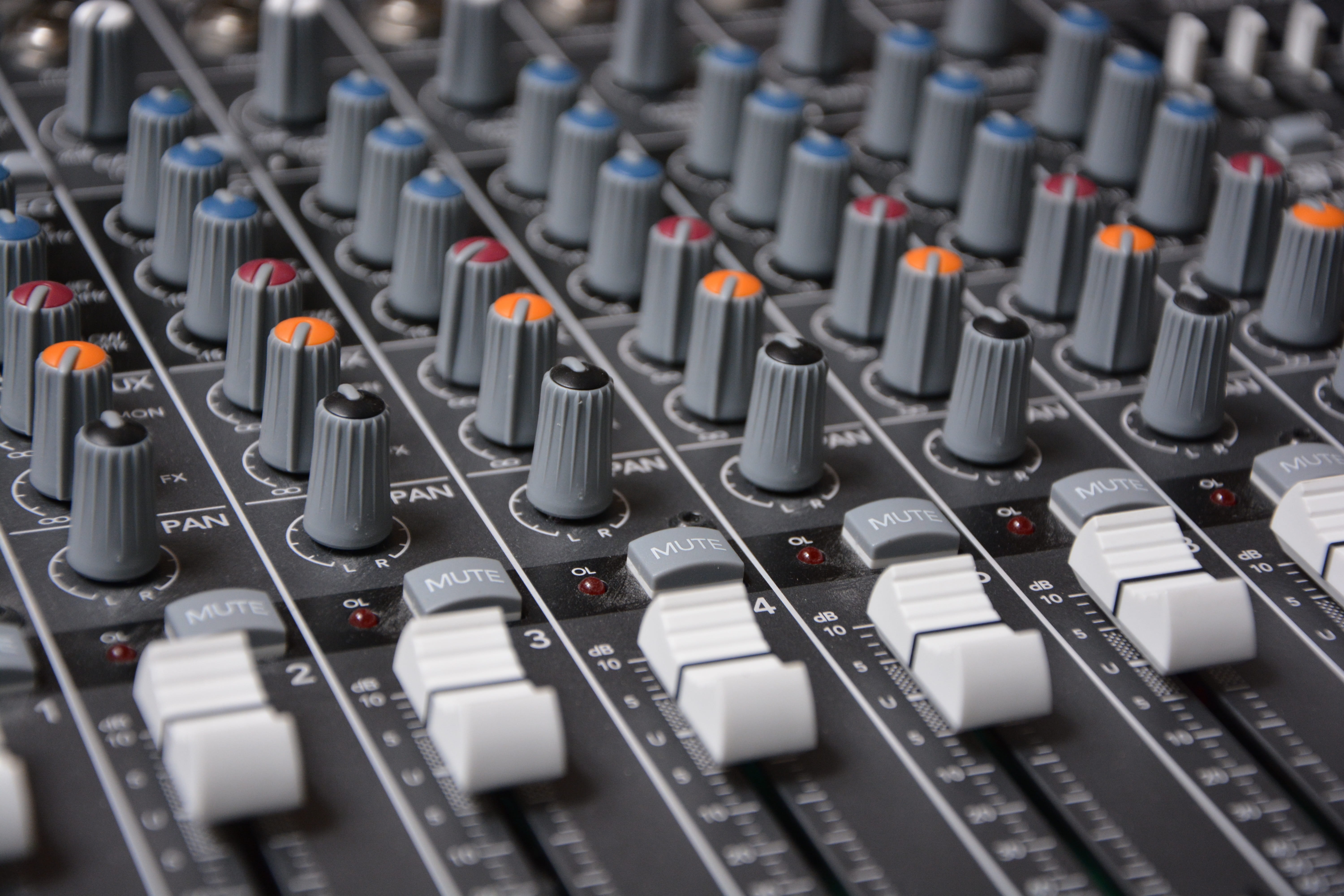 macro shot of gray studio mixer digital analog audio controller 2k 4k 5k