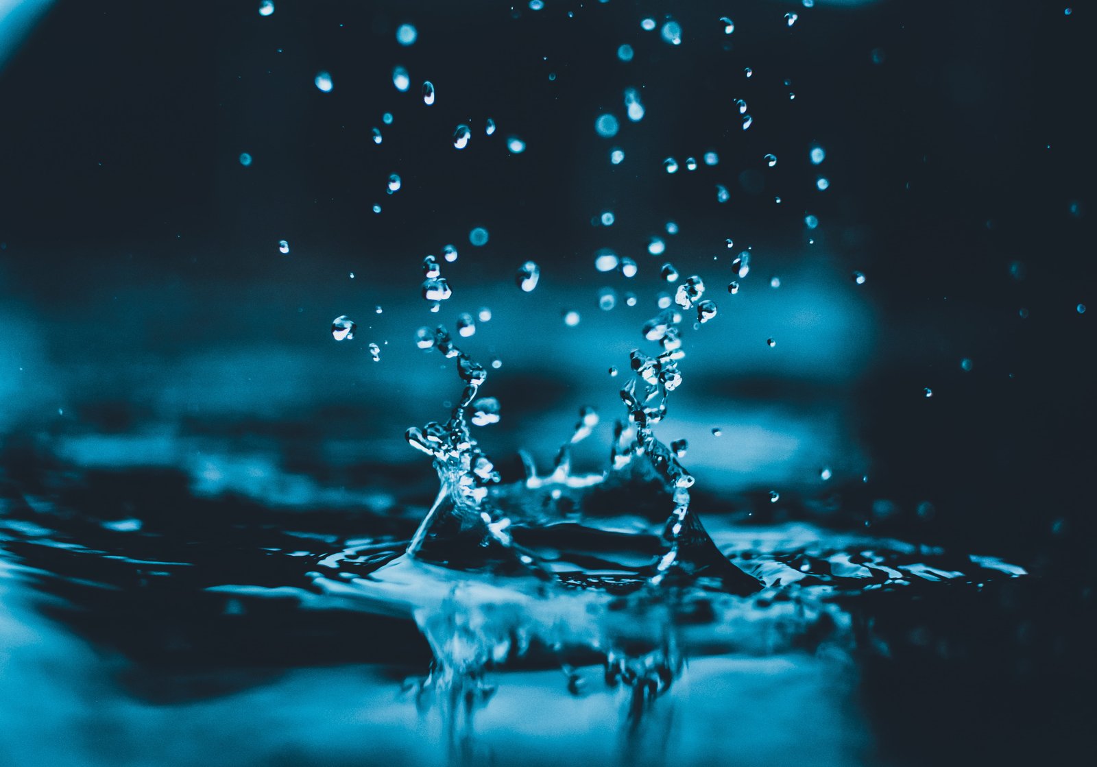 Shallow Focus Photography of Water Splash blue water blur close up 2k 4k 5k