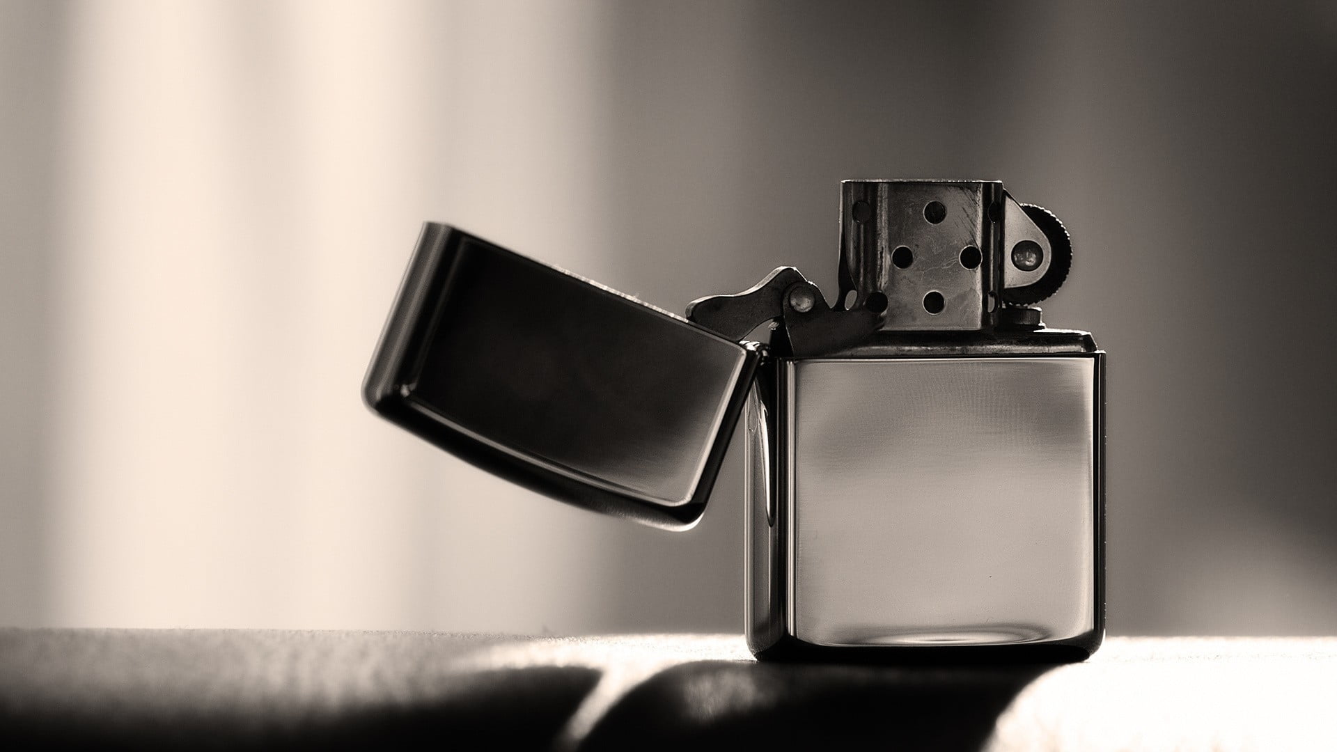 silver flip top lighter untitled closeup zippo macro monochrome 2k