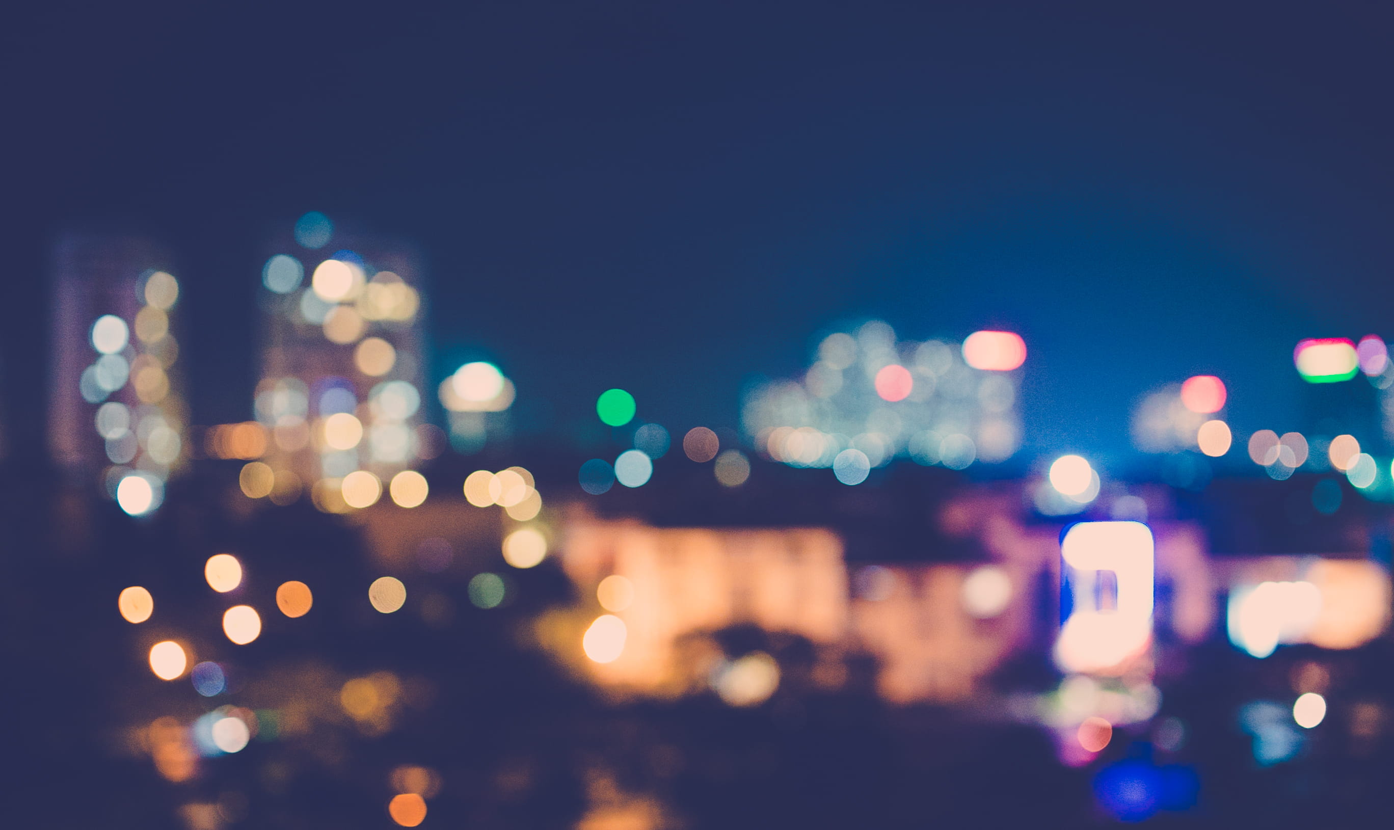 city lights at night bokeh light building defocused 2k