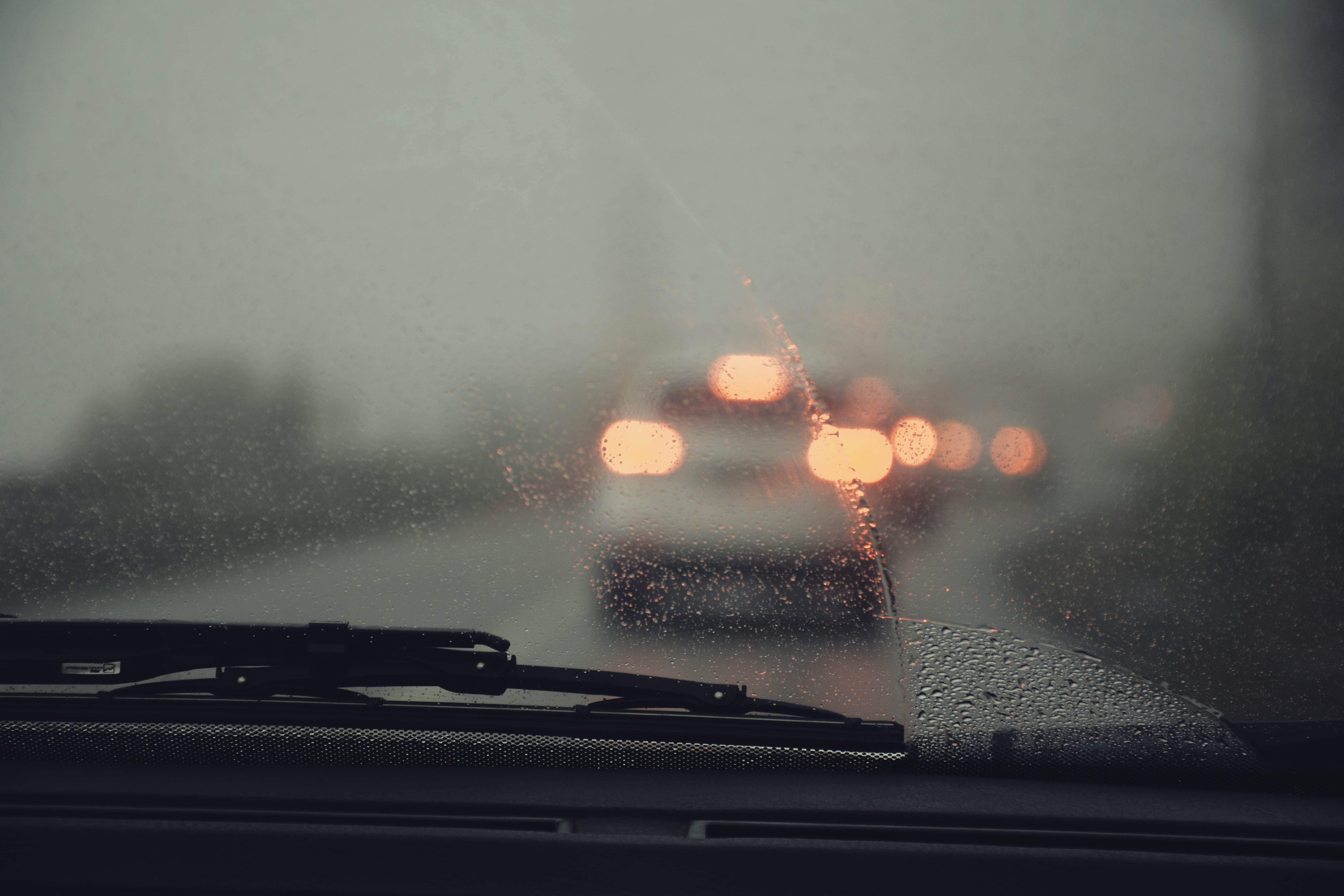vehicle glass with water droplets windscreen light rain windshield 2k 4k 5k