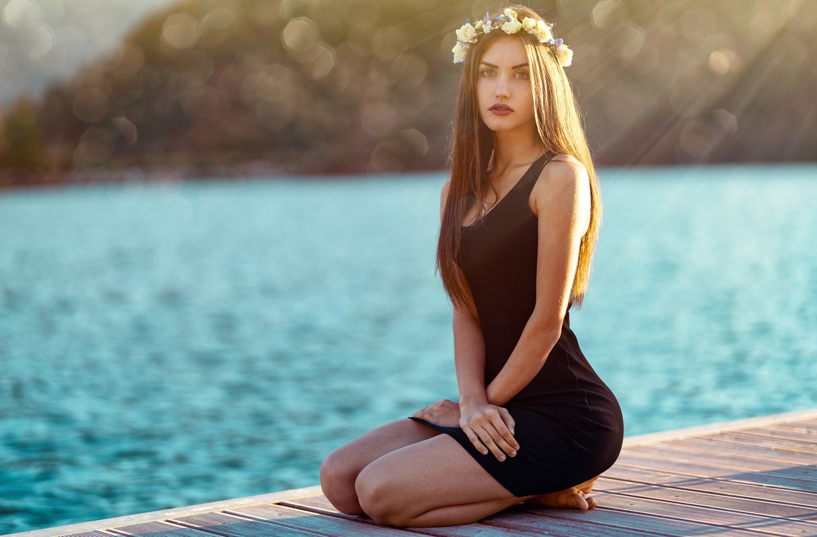 women kneeling Marco Squassina bokeh sea black dress long hair 2k