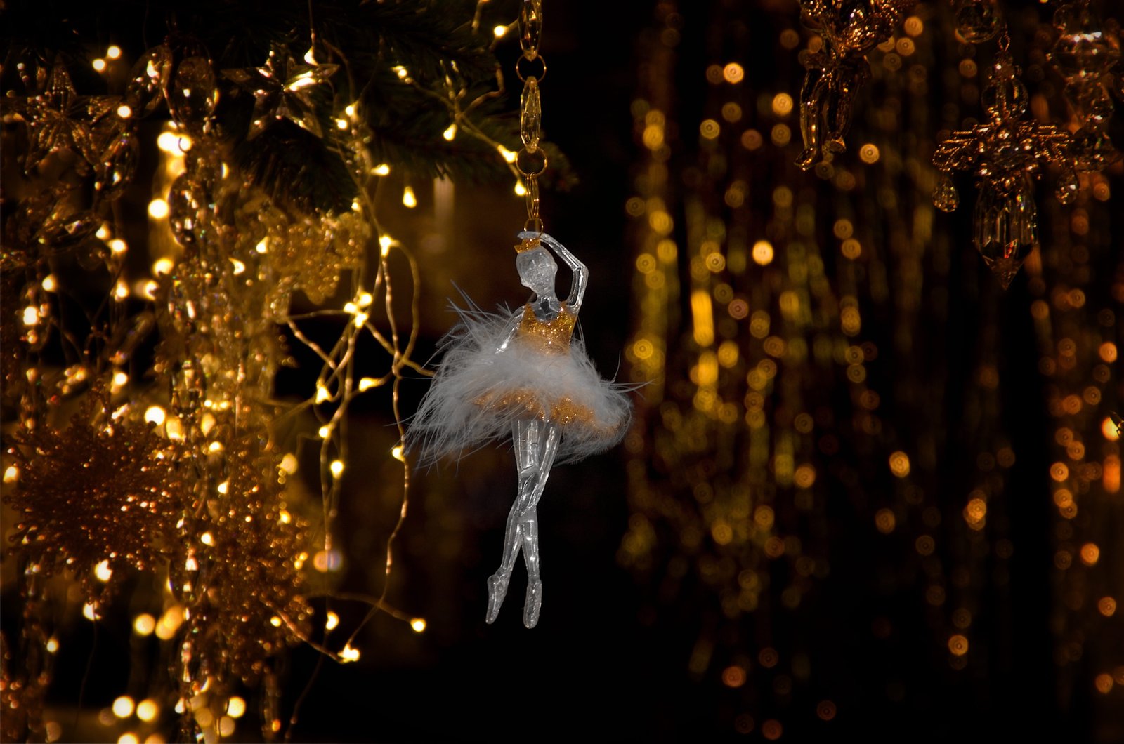 clear glass ballerina ornament in tilt shift lens photography 2k 4k 5k