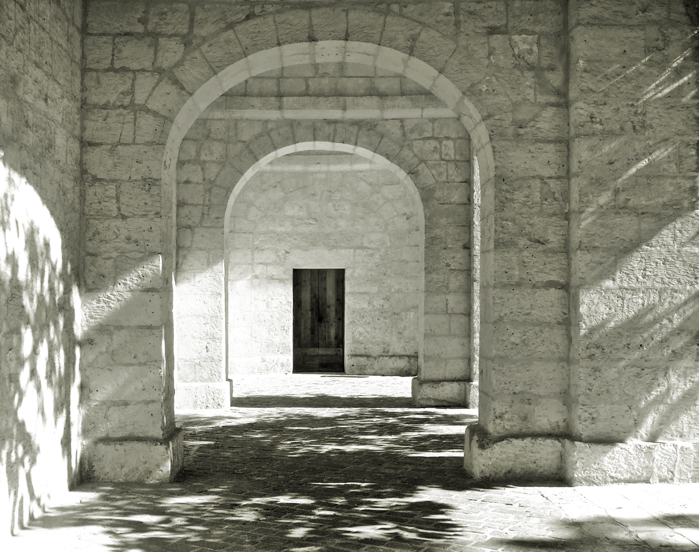 gray concrete arc arch arches archway church shadows landmark 2k
