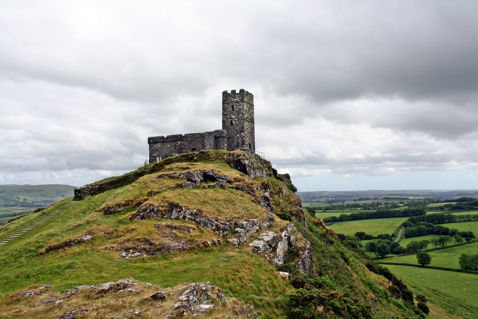 gray concrete castle on top of mountain lost places ruin moor 2k 4k