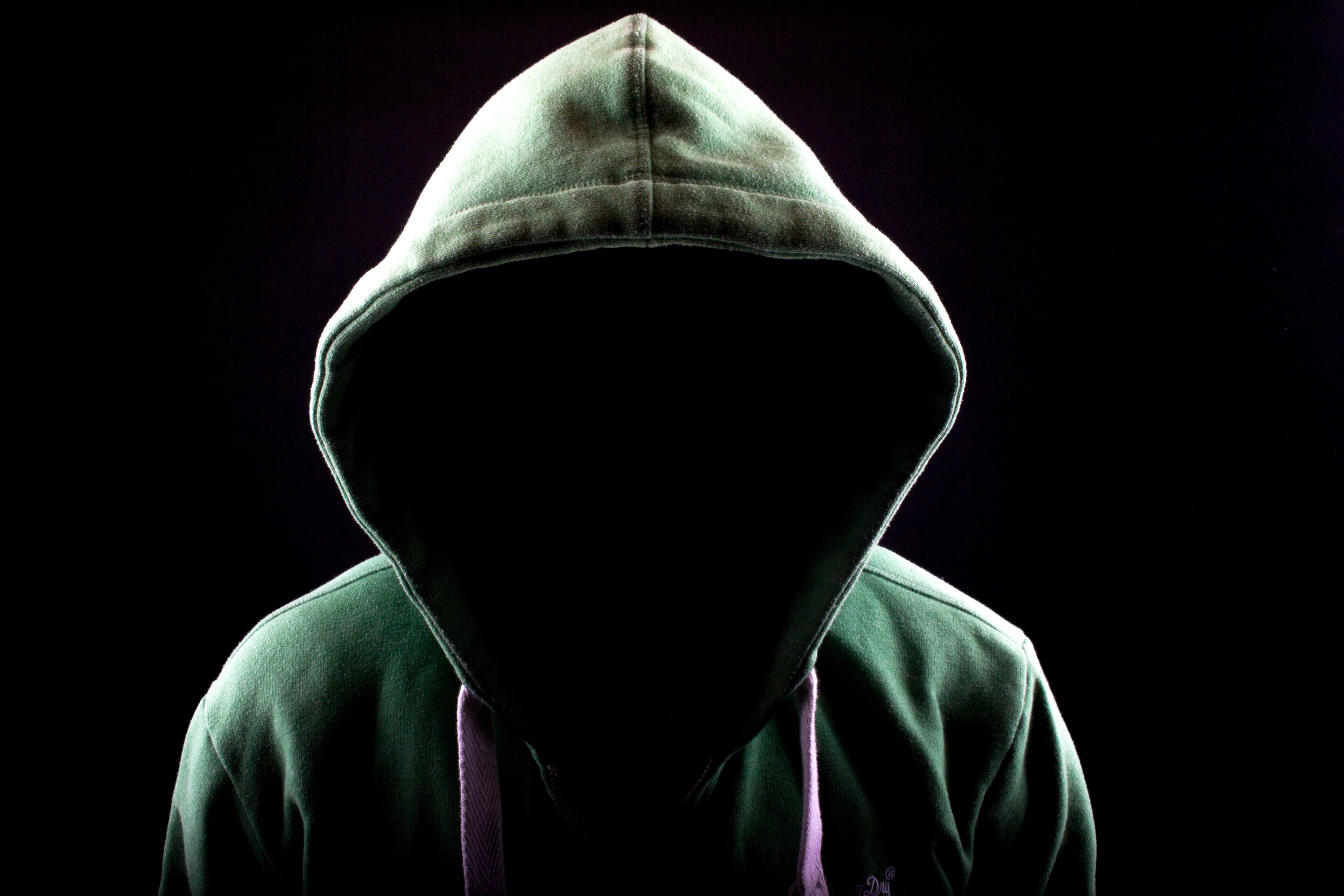 person wearing green hooded jacket man dark gloomy mood mystical 2k 4k 5k