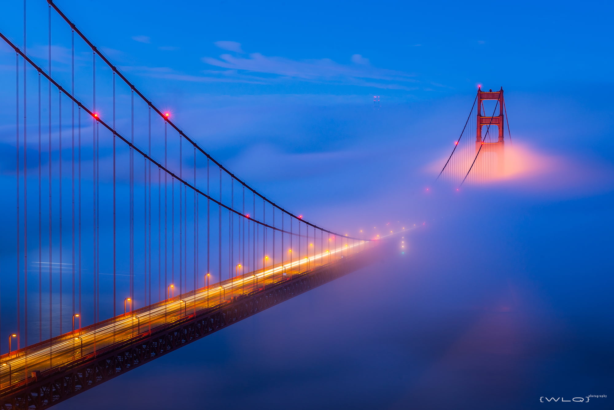 photo of Golden Gate Bridge Mystic Towers Low fog San Francisco 2k