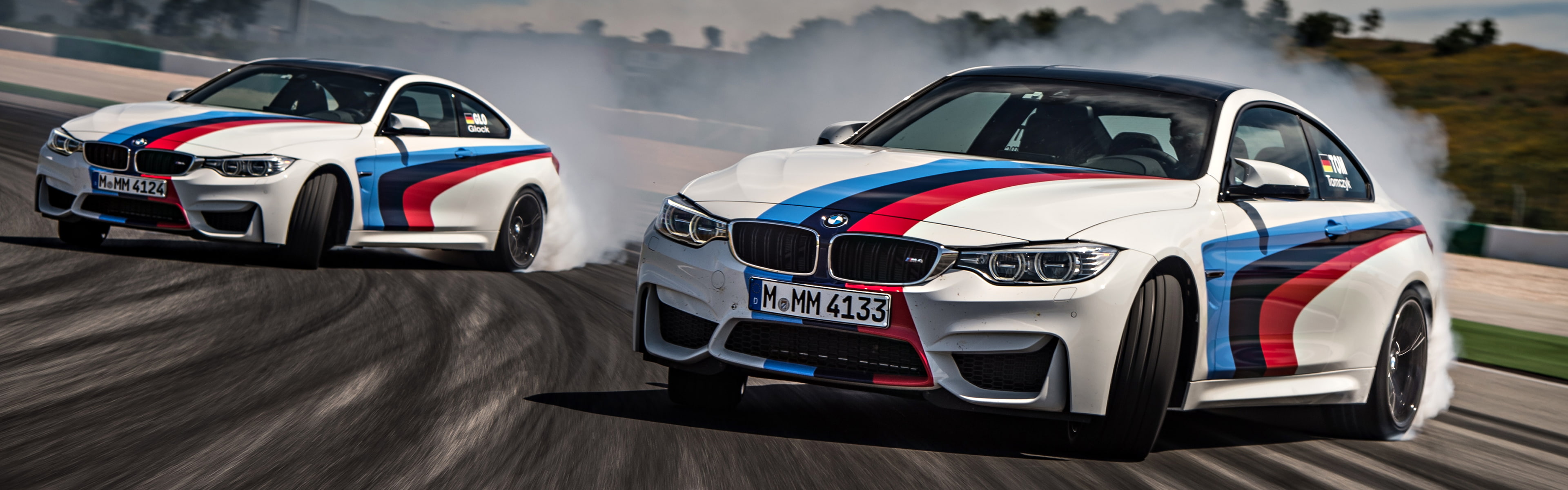 BMW race tracks Drifting car vehicle motion blur smoke widescreen dualmonitor dualscreen 2k 4k